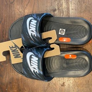 Nike men’s size 9 slides. New with tags